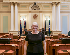 Person standing in the green chamber